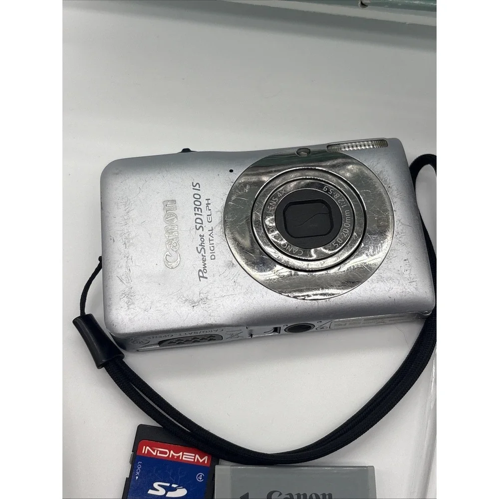 Canon PowerShot SD1300 IS 12.1MP Digital Camera Bundle Battery Charger SD Tested